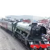 Amazing drone footage shows thousands watch Flying Scotsman roll into historic Derby train site