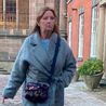 Woman betrayed trust of her elderly neighbour to take her cash