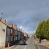 Man charged with attempted murder after woman found in critical condition