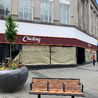 Activity inside prominent city building as worldwide fast food restaurant set to open