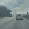 A38 bus fire causes growing two-mile queues - as it happened