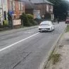 Readers back driver who swerved into bus lane to avoid damaged road