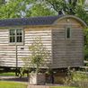 Grass-walled holiday cabins and farm shop plan for Derbyshire countryside site