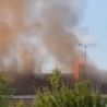 House fire sees crews rush to street as smoke billows over skyline
