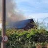 Road reopens after derelict building fire sends black smoke into the sky