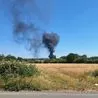 Smoke billows into the sky as crews rush to Stanton dairy farm fire